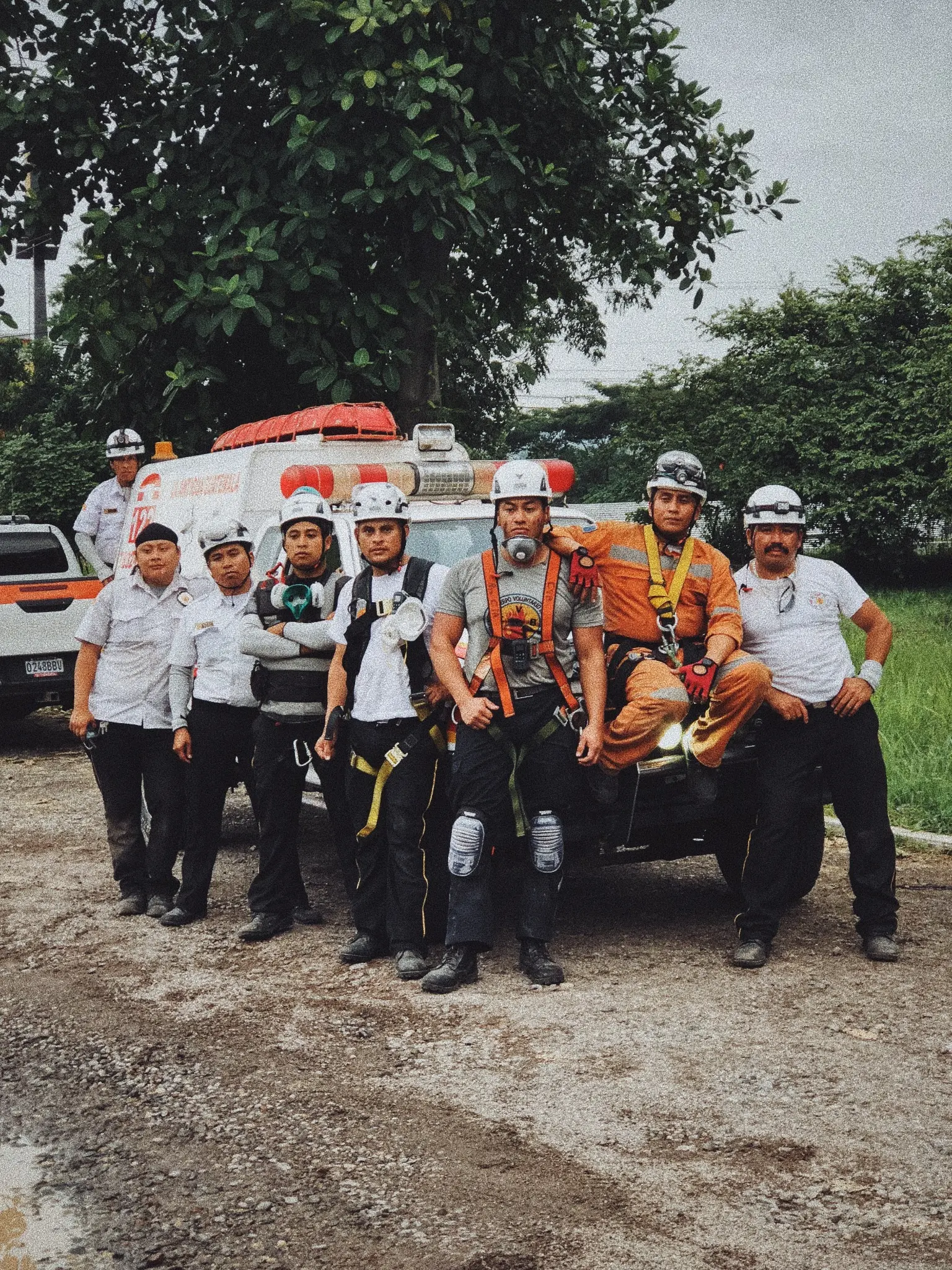 A mountain rescue team gathered for a portrait