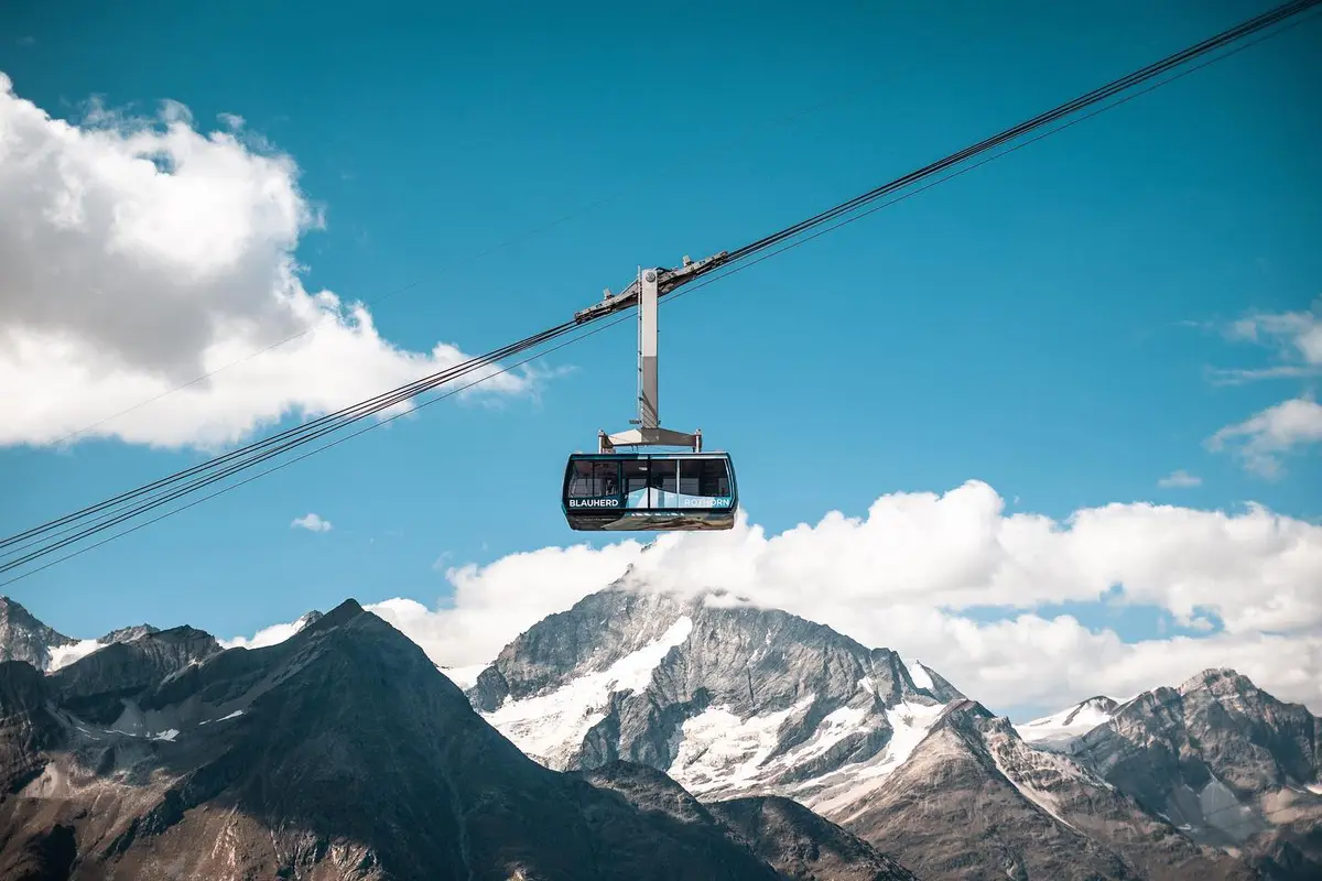 Cable car crossing a mountain landscape